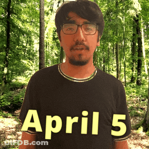 A Man Wearing Glasses And A Black Shirt With April 5 Written On It GIF