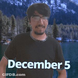 A Man Wearing Glasses And A Black Shirt With December 5 Written On It GIF
