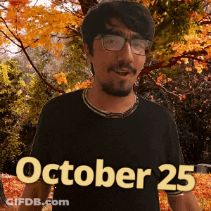 A Man Wearing Glasses And A Black Shirt With October 25 On It GIF