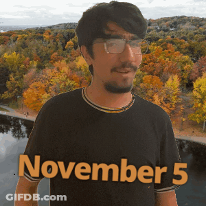 A Man Wearing Glasses And A Black Shirt With The Date November 5 GIF