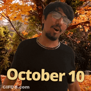 A Man Wearing Glasses And A Black Shirt With The Date October 10 GIF