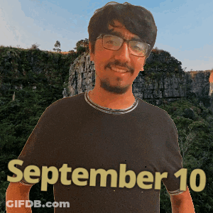A Man Wearing Glasses And A Black Shirt With The Date September 10 GIF