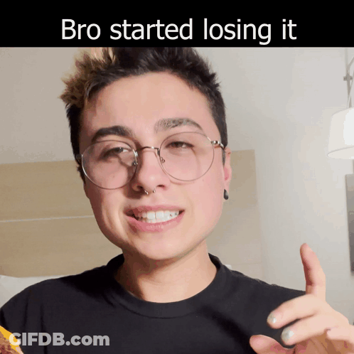 A Man Wearing Glasses And A Black Shirt With The Words Bro Started Losing It On The Bottom GIF