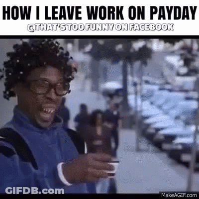 A Man Wearing Glasses And A Blue Jacket Is Standing On A Sidewalk . GIF