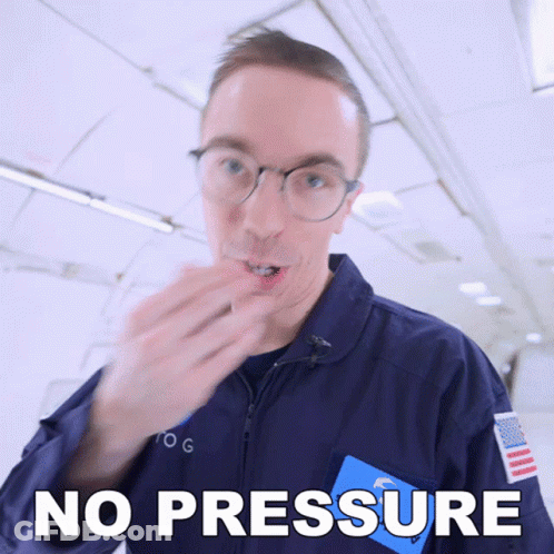 A Man Wearing Glasses And A Blue Jacket Says " No Pressure " GIF