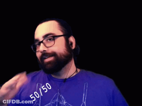A Man Wearing Glasses And A Blue Shirt Has The Number 50/50 Written On His Shirt GIF