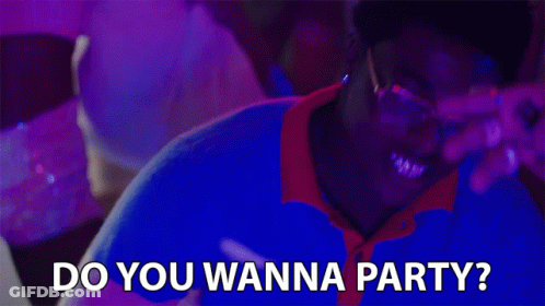 A Man Wearing Glasses And A Blue Shirt Is Asking Do You Wanna Party GIF