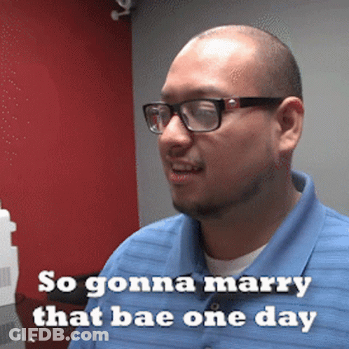 A Man Wearing Glasses And A Blue Shirt Is Saying So Gonna Marry That Bae One Day GIF