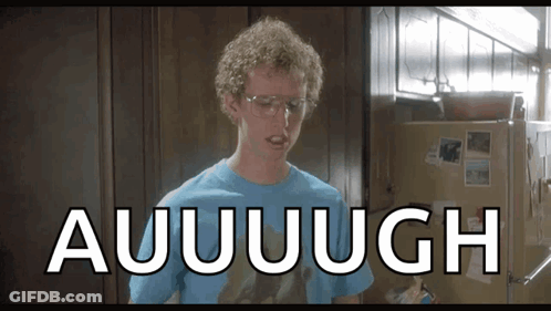 A Man Wearing Glasses And A Blue Shirt Is Standing In Front Of A Refrigerator That Says Auuuugh GIF