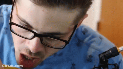 Man With Glasses Looking At Something GIF
