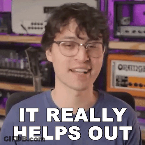 A Man Wearing Glasses And A Blue Shirt Says It Really Helps Out . GIF