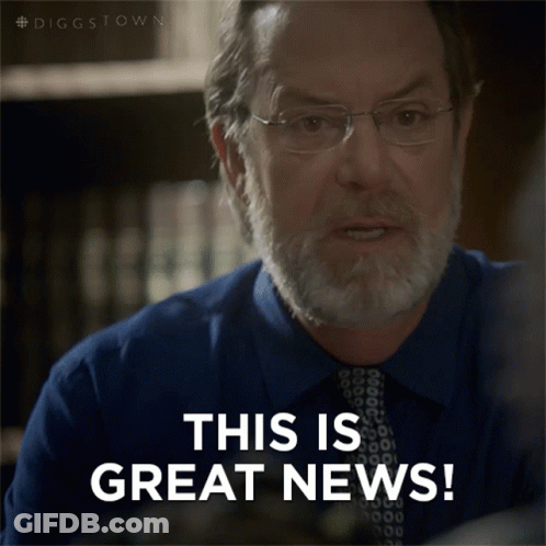 A Man Wearing Glasses And A Blue Shirt Says This Is Great News GIF
