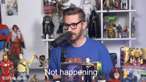 A Man Wearing Glasses And A Blue Shirt Stands In Front Of A Microphone With The Words " Not Happening " Below Him GIF