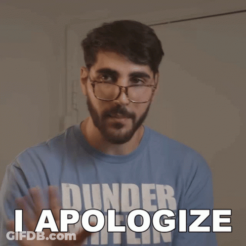 A Man Wearing Glasses And A Blue Shirt That Says Dunder Apologizes GIF