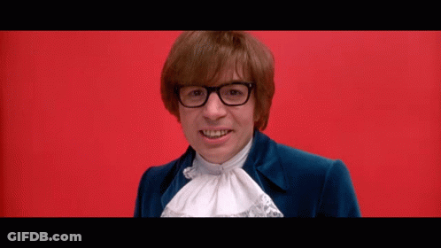 Man In Glasses Blue Suit Says Yeah Baby GIF