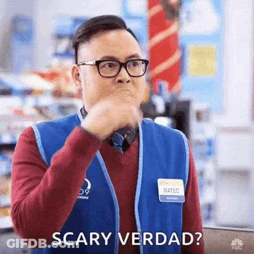 A Man Wearing Glasses And A Blue Vest Says Scary Verdad GIF
