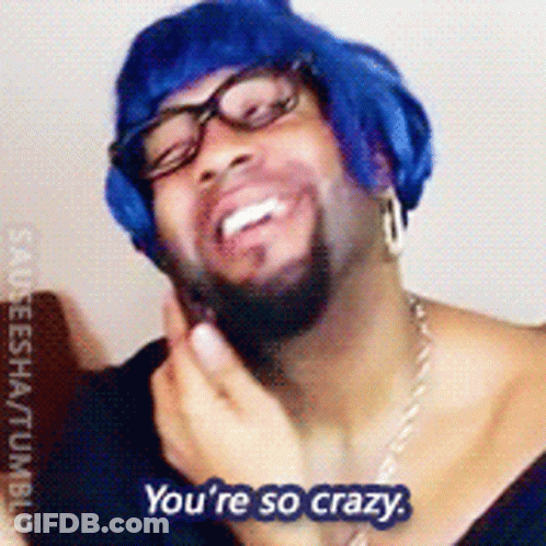A Man Wearing Glasses And A Blue Wig Is Saying You 'Re So Crazy GIF
