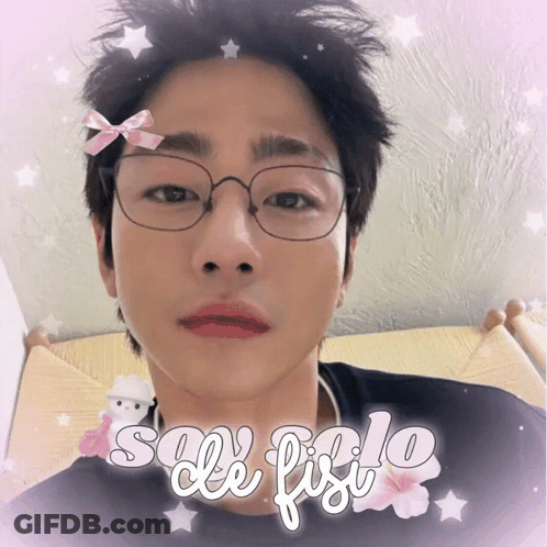 A Man Wearing Glasses And A Bow On His Forehead Is Surrounded By The Words Sole Fiolo GIF