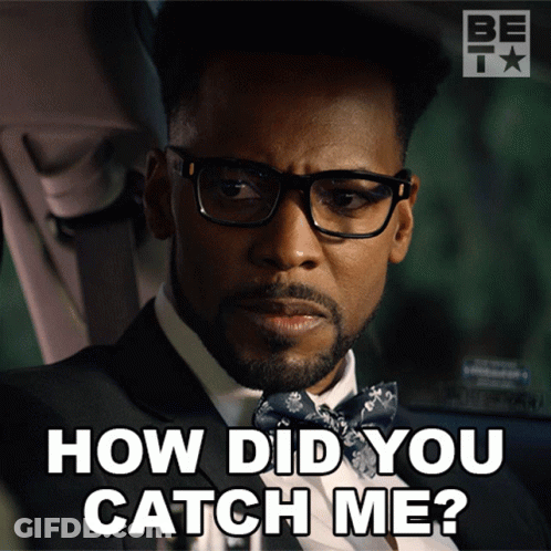 A Man Wearing Glasses And A Bow Tie Is Asking How Did You Catch Me GIF