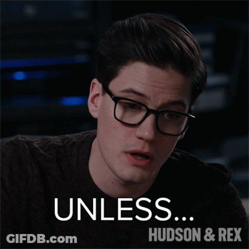 A Man Wearing Glasses And A Brown Sweater Says Unless Hudson & Rex GIF