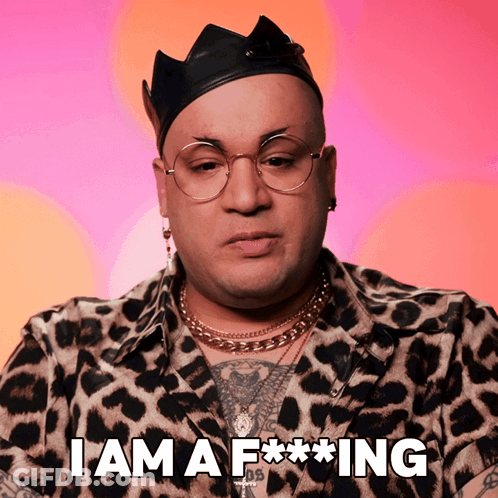 A Man Wearing Glasses And A Crown Says I Am A F * * * Ing GIF