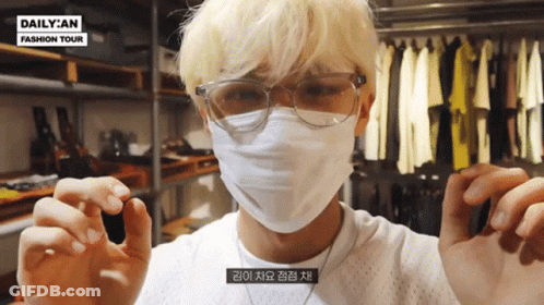 A Man Wearing Glasses And A Face Mask With Daily An Fashion Tour On The Bottom GIF
