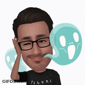 A Man Wearing Glasses And A Figure Shirt Is Surrounded By Two Ghosts GIF