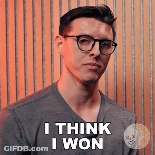 A Man Wearing Glasses And A Gray Shirt Says I Think I Won GIF