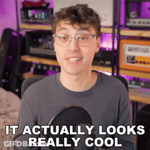 A Man Wearing Glasses And A Gray Shirt Says It Actually Looks Really Cool GIF