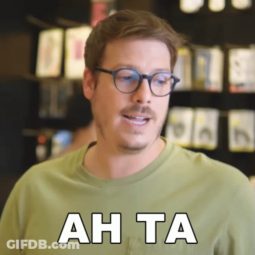 Man With Glasses And Green Shirt Ah Ta GIF