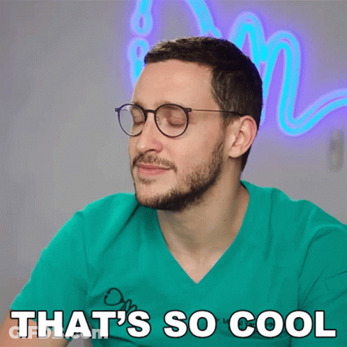 A Man Wearing Glasses And A Green Shirt With The Words That 'S So Cool GIF