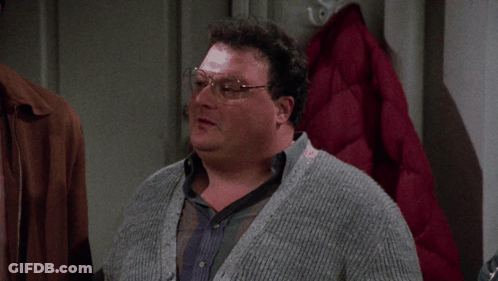 A Man Wearing Glasses And A Grey Sweater Says " Sometimes " GIF