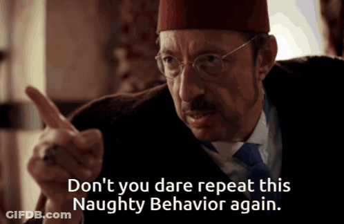 A Man Wearing Glasses And A Hat Says " Don T You Dare Repeat This Naughty Behavior Again " GIF