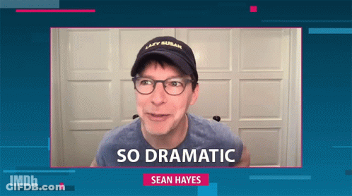 A Man Wearing Glasses And A Hat That Says Lazy Susan On It GIF