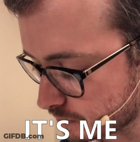 A Man Wearing Glasses And A Headset With The Words It 'S Me On His Face GIF