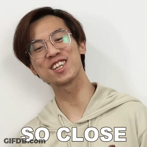 A Man Wearing Glasses And A Hoodie Has The Word So Close On His Shirt GIF