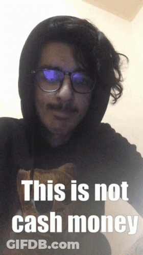 A Man Wearing Glasses And A Hoodie With The Words This Is Not Cash Money Below Him GIF
