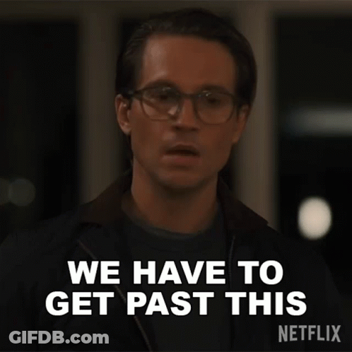 A Man Wearing Glasses And A Jacket Is Saying We Have To Get Past This . GIF