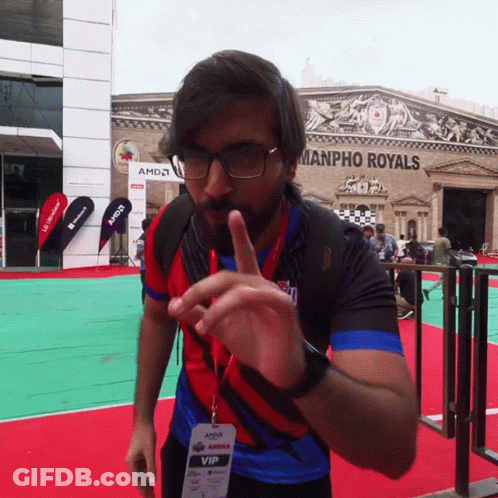 A Man Wearing Glasses And A Lanyard That Says Amd Vip GIF