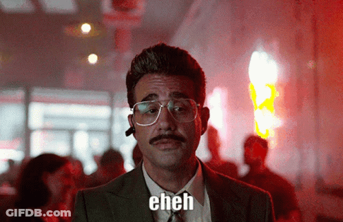 A Man Wearing Glasses And A Mustache Says Eh GIF