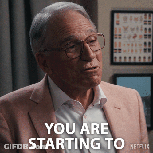 A Man Wearing Glasses And A Pink Suit Says You Are Starting To Netflix GIF