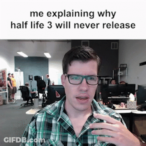 A Man Wearing Glasses And A Plaid Shirt Explaining Why Half Life 3 Will Never Release GIF