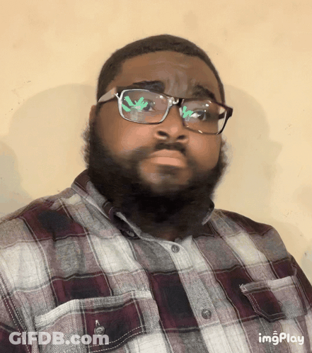 A Man Wearing Glasses And A Plaid Shirt Has The Word Imgplay At The Bottom Of His Image GIF