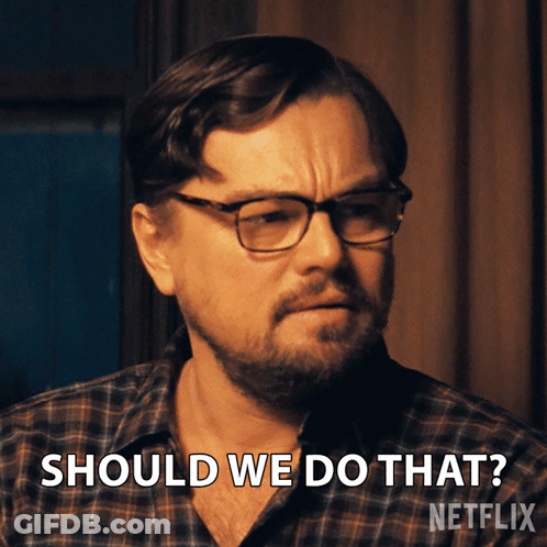 A Man Wearing Glasses And A Plaid Shirt Says " Should We Do That " GIF