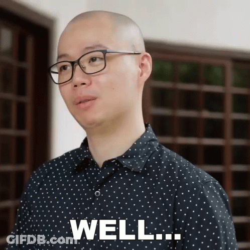 A Man Wearing Glasses And A Polka Dot Shirt Says " Well " GIF