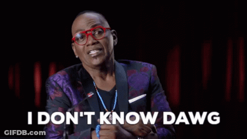 A Man Wearing Glasses And A Purple Suit Is Talking Into A Microphone And Saying `` I Don T Know Dawg '' GIF