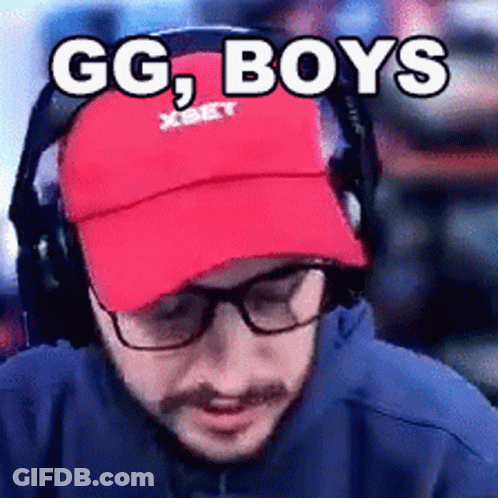 A Man Wearing Glasses And A Red Hat With The Words Gg Boys On It GIF