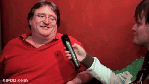 A Man Wearing Glasses And A Red Shirt Is Holding A Microphone And The Word Uhm Is Above His Head GIF
