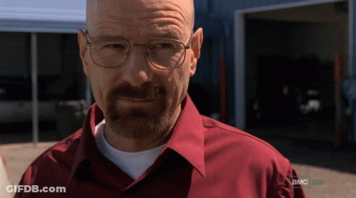 A Man Wearing Glasses And A Red Shirt That Says A.m.c. GIF
