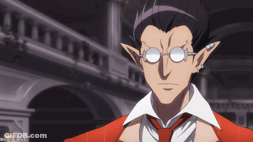 A Man Wearing Glasses And A Red Suit Has The Word Dream Written Below Him GIF